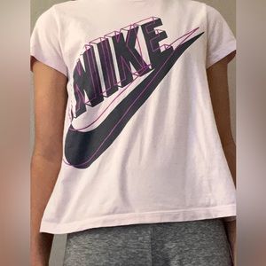 Pink Nike short sleeve shirt.